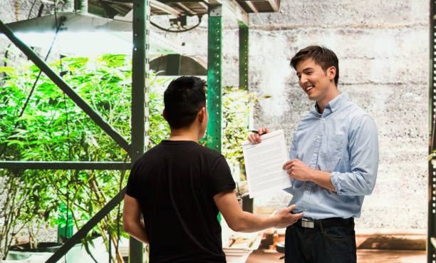 istock Customer buying legal marijuana 950664442