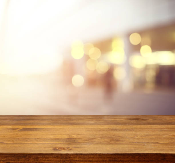 istock defocused city lights and wooden background 950665228