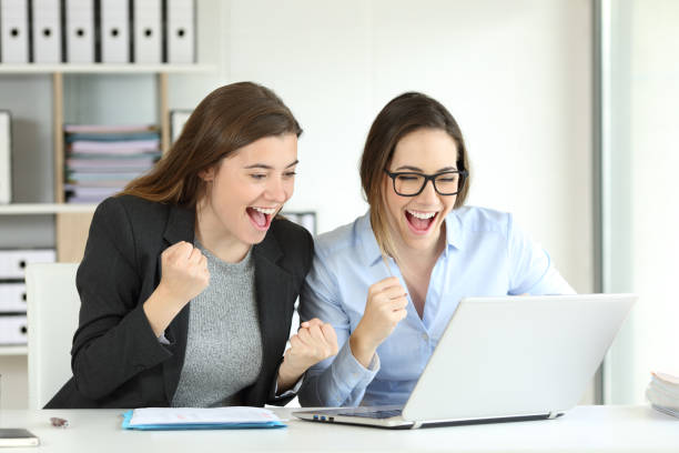 istock Two excited executives celebrating success 950675230