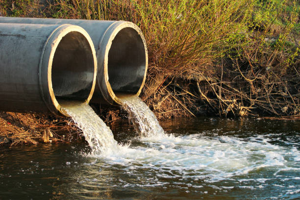 istock Discharge of sewage into a river 950679744