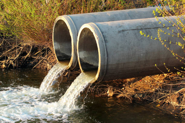 istock Discharge of sewage into a river 950679778
