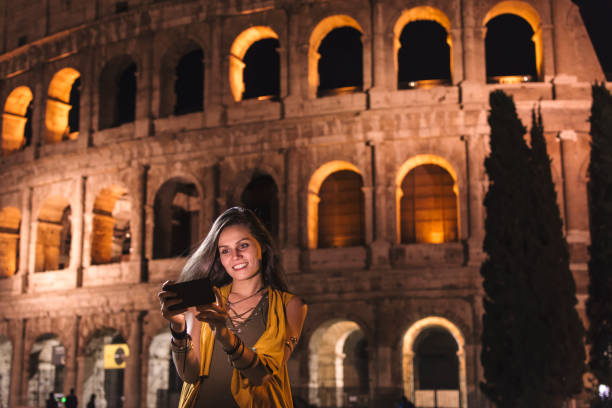 istock Smiling girl with phone 950679934