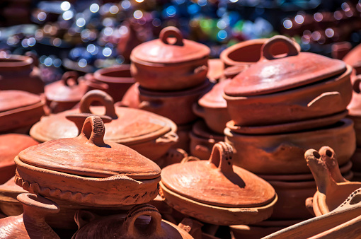 traditional Arabic handcrafted, tajine pottery in a street market (souk), Meknes, Morocco