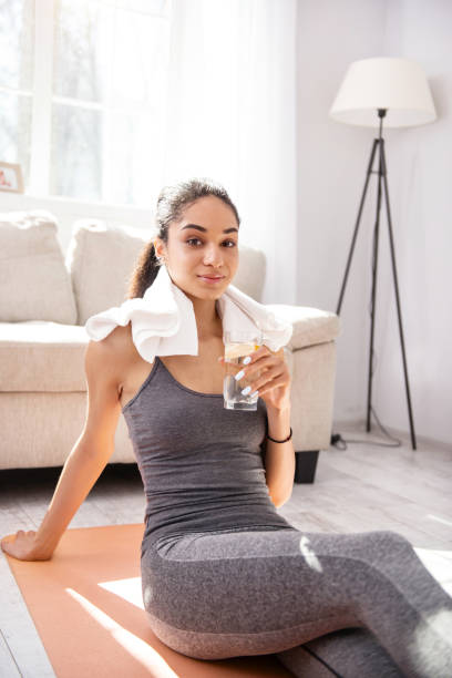 istock Pleasant woman drinking water after a workout 950683014