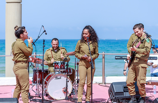Cuban Musicians in traditional costumes perform for tourists, Santa Maria, Santa Clara, Cuba, spring 2018
