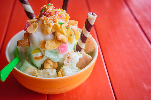 Shaved ice, thai style dessert made of shaved ice, bread, sweetened condensed milk.
