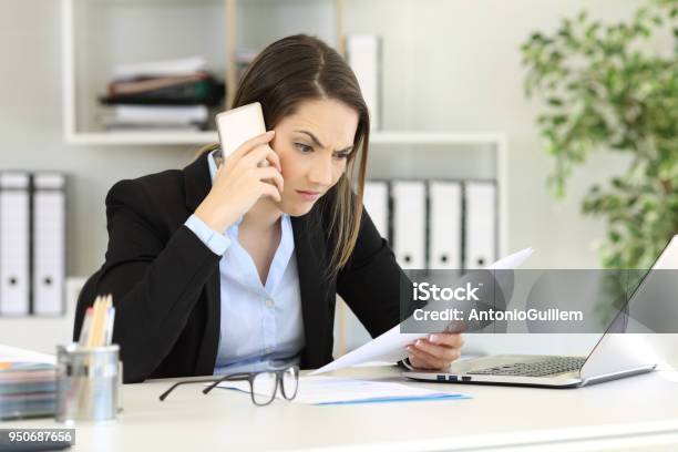 Angry Executive Calling On Phone At Office Stock Photo - Download Image Now - Office, One Woman Only, Women