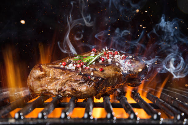 istock Beef steak on the grill with flames 950689454