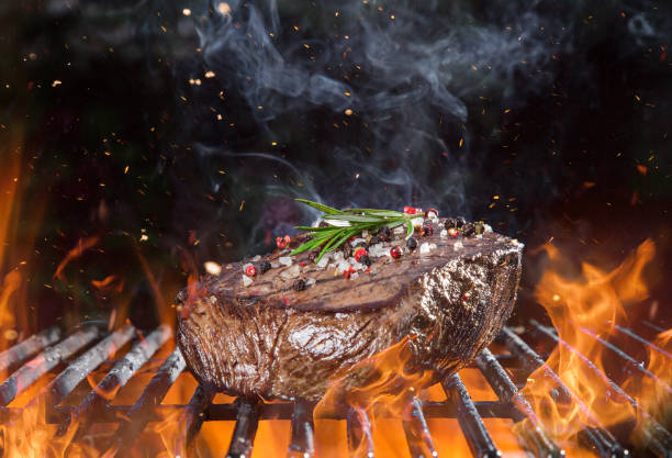 istock Beef steak on the grill with flames 950689524