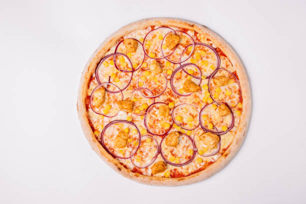 istock Pizza with chicken, onion and corn isolated on white. Top view 950689754