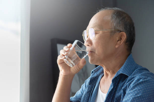 istock Asian Senior man drinking water. 950694596