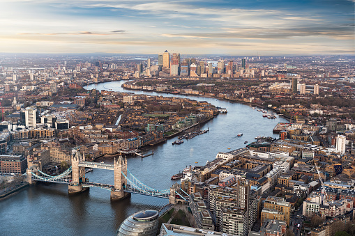 Tower Bridge and HMS Belfast at sunset, London, England