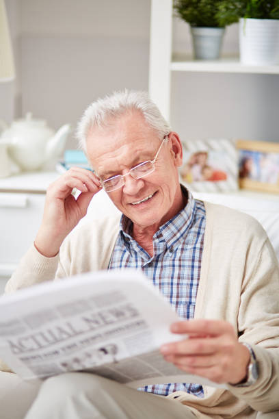 istock Good news in the paper 950698496