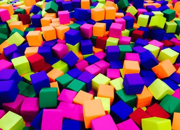istock Many colorful soft blocks in a kids' pool at a playground. Textile cubes 950707432