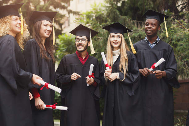 istock A group of graduates celebrating 950711744