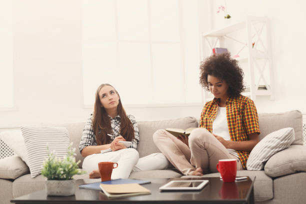 istock Two female friends preparing for exam at home 950712318