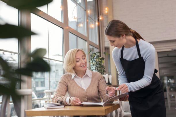 istock Joyful woman making an order 950713690
