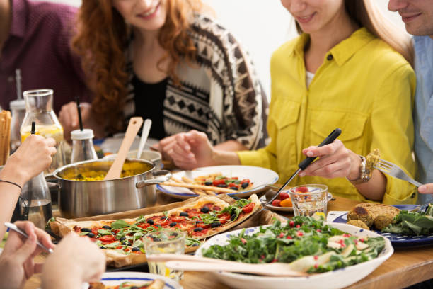 istock Vegan friends at home 950720262