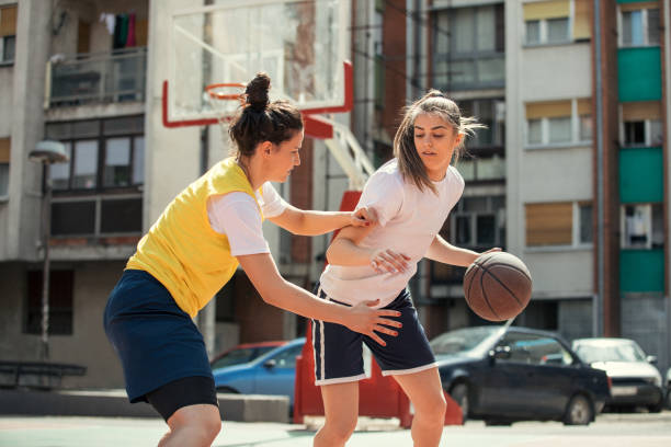 istock Practicing defence on a street court 950723442