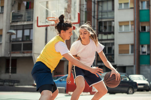 istock Practicing defence on a street court 950723796