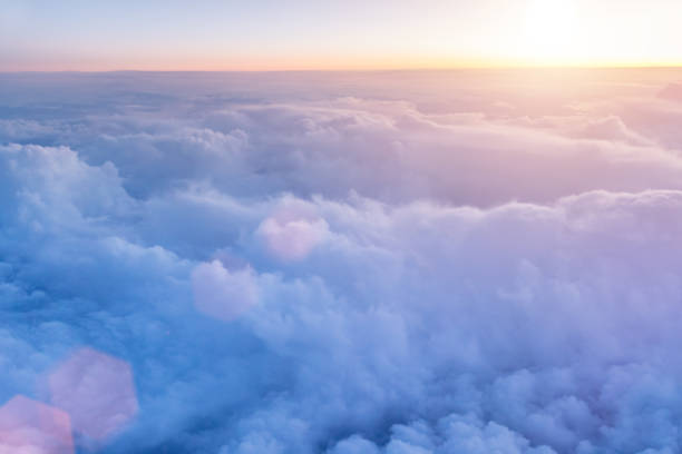 istock Beautiful sunset with cloudy sky from the airplane window 950725824