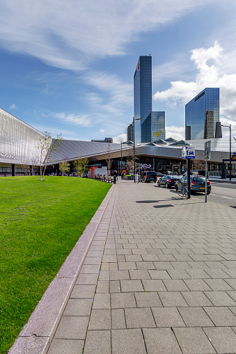 Rotterdam -  Rotterdam Centralstation with View to the Delft Gate Building, a twin-tower skyscraper complex next to the railway station, South Holland, Netherlands, Rotterdam, 16.04.2018