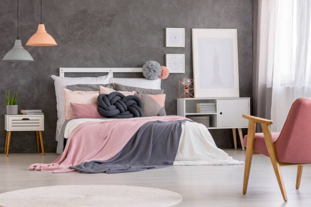 istock Cozy bed in pastel bedroom 950740166