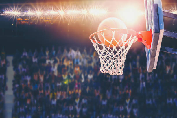 istock basketball scoring during match in arena 950740172