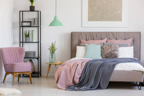 istock Feminine bedroom with white walls 950740180