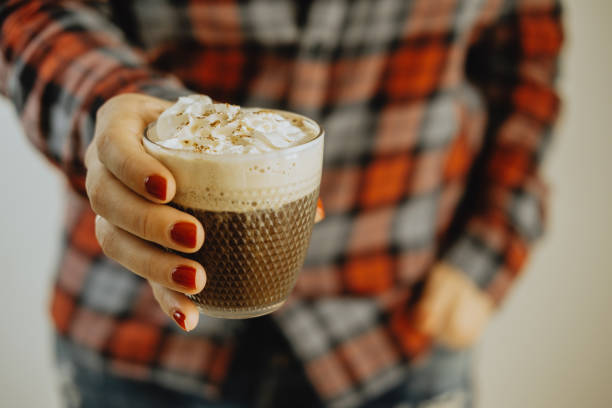 istock Woman hands holding coffee with cream