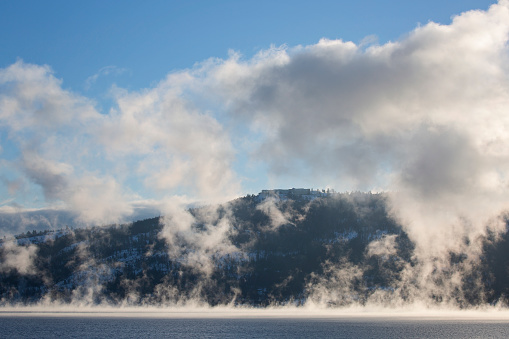 Clouds hover and dance on Okanagan Lake