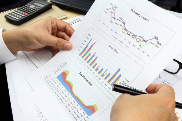 istock Businessman Summary report and buy market plan analyzing order plan 950762538