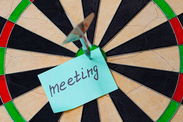 istock Dart hit the centre of target and attaches sticker 950762942
