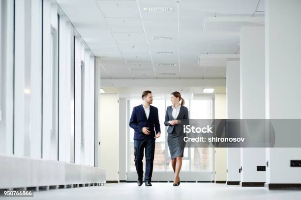 Manager With His Secretary Stock Photo - Download Image Now - Walking, Businessman, Business Person