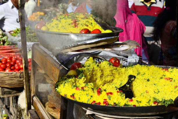indian street food poha - gooseberry fruit berry bowl stock-fotos und bilder