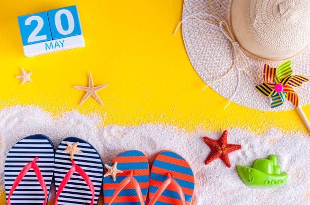 istock May 20th. Image of may 20 calendar with summer beach accessories. Spring like Summer vacation concept 950771894