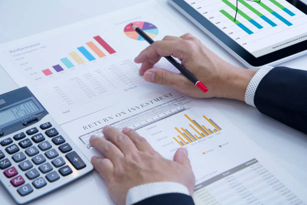 istock Reviewing a financial report in returning on investment analysis 950772072