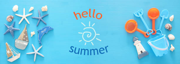 istock vacation and summer banner with sea life style objects and beach toys for kid. 950772464