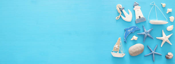istock nautical, vacation and travel banner with sea life style objects. Top view. 950772472