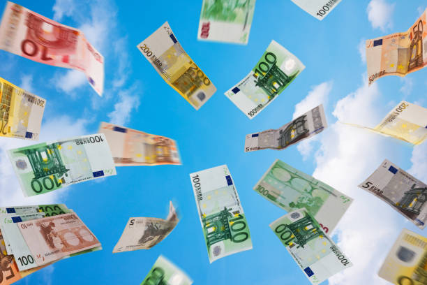 istock Euro money fallig down on the sky 950773196