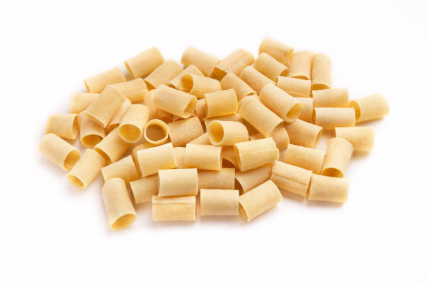 istock Pile of raw paccheri on white background 950773578
