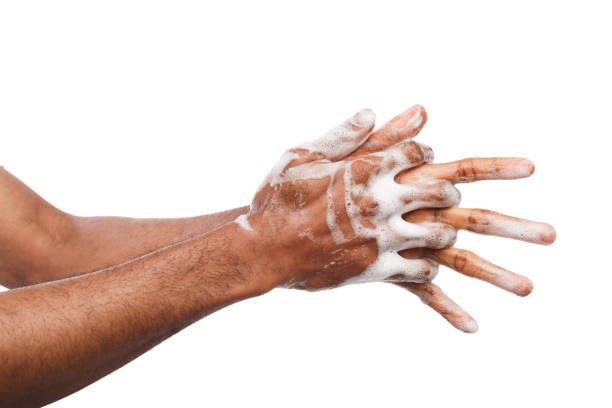 istock Black man washing hands isolated on white background 950777694
