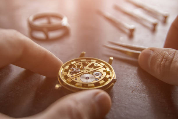 istock Watchmaker is repairing the mechanical watches in his workshop 950778442