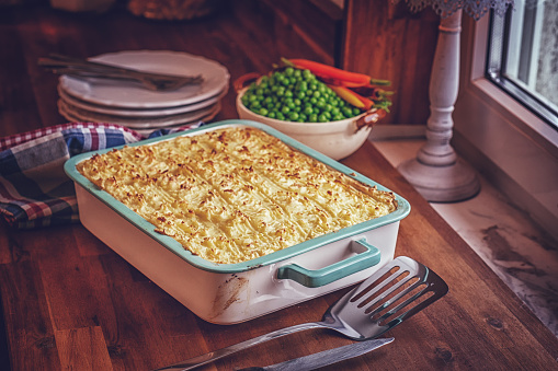 Traditional British Shepard`s Pie with minced meat and vegetables
