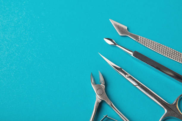 istock Manicure supplies on blue background 950784724