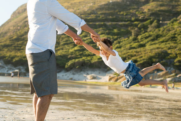 istock Father and daughter having fun outdoors 950787506