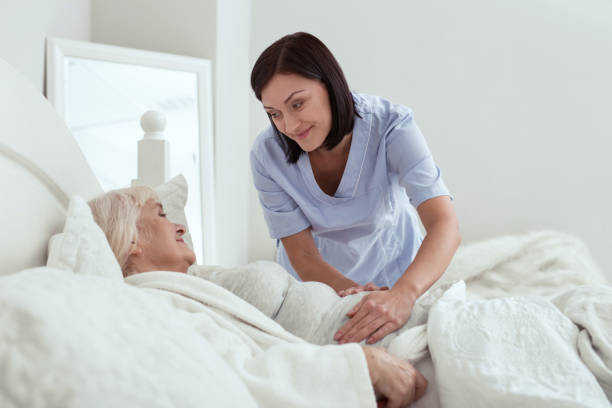 istock Appealing glad nurse setting pain area 950788212