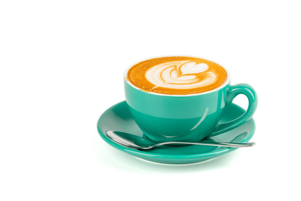 istock Hot latte coffee with latte art in a green cup isolated on white background with clipping path. 950791156