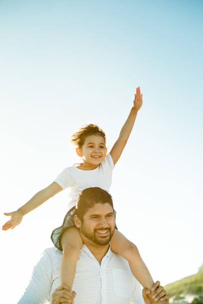 istock Father and daughter having fun outdoors 950792032