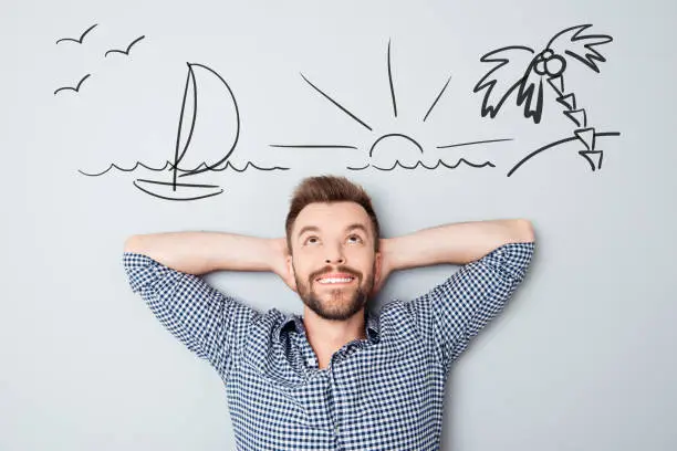 Photo of Happy young man dreaming about vacation. Drawn picture of seaside overhead